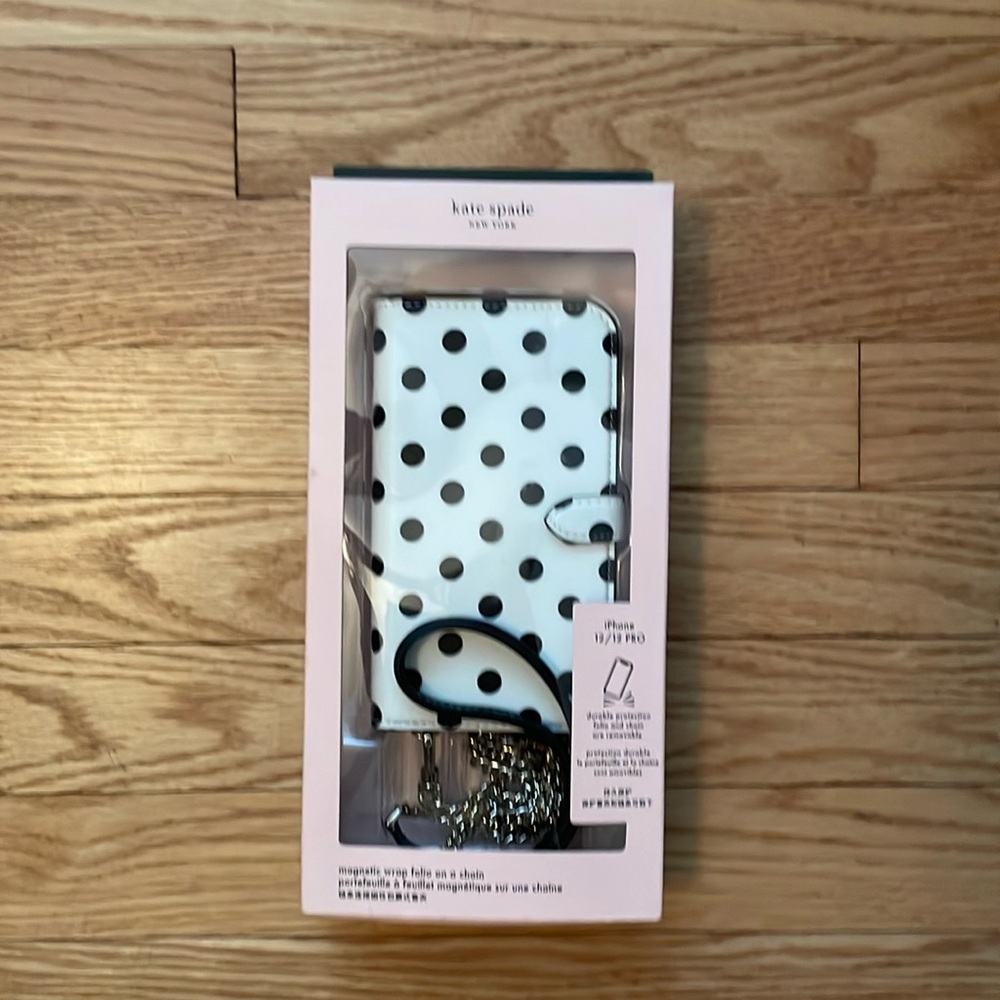 Kate Spade crossbody phone case. Fits iPhone 12/12 pro. Brand new in box.